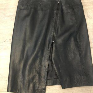 Asymmetrical, leather zippered skirt